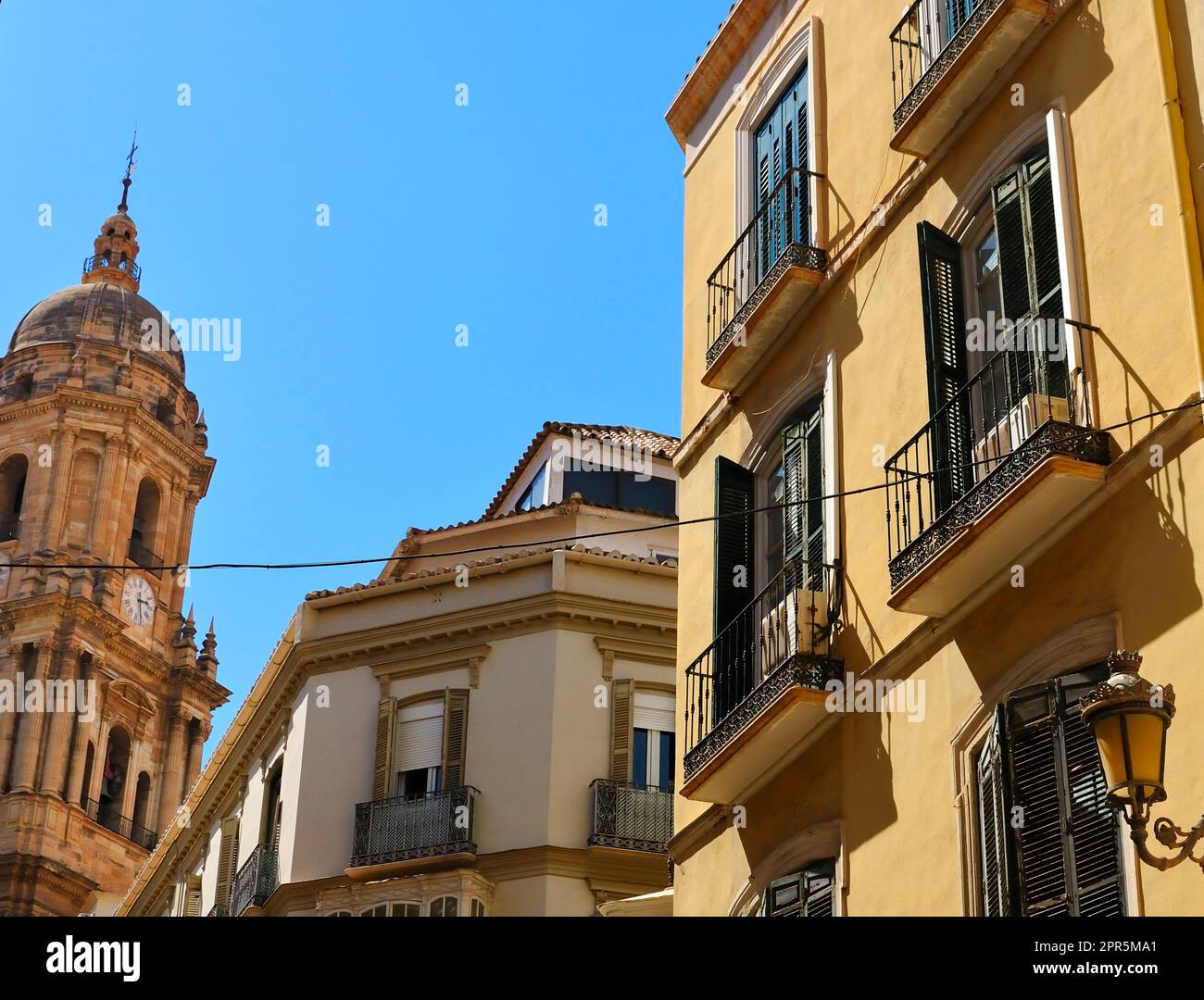 Typical Spanish apartment buildings in Malaga old town with the