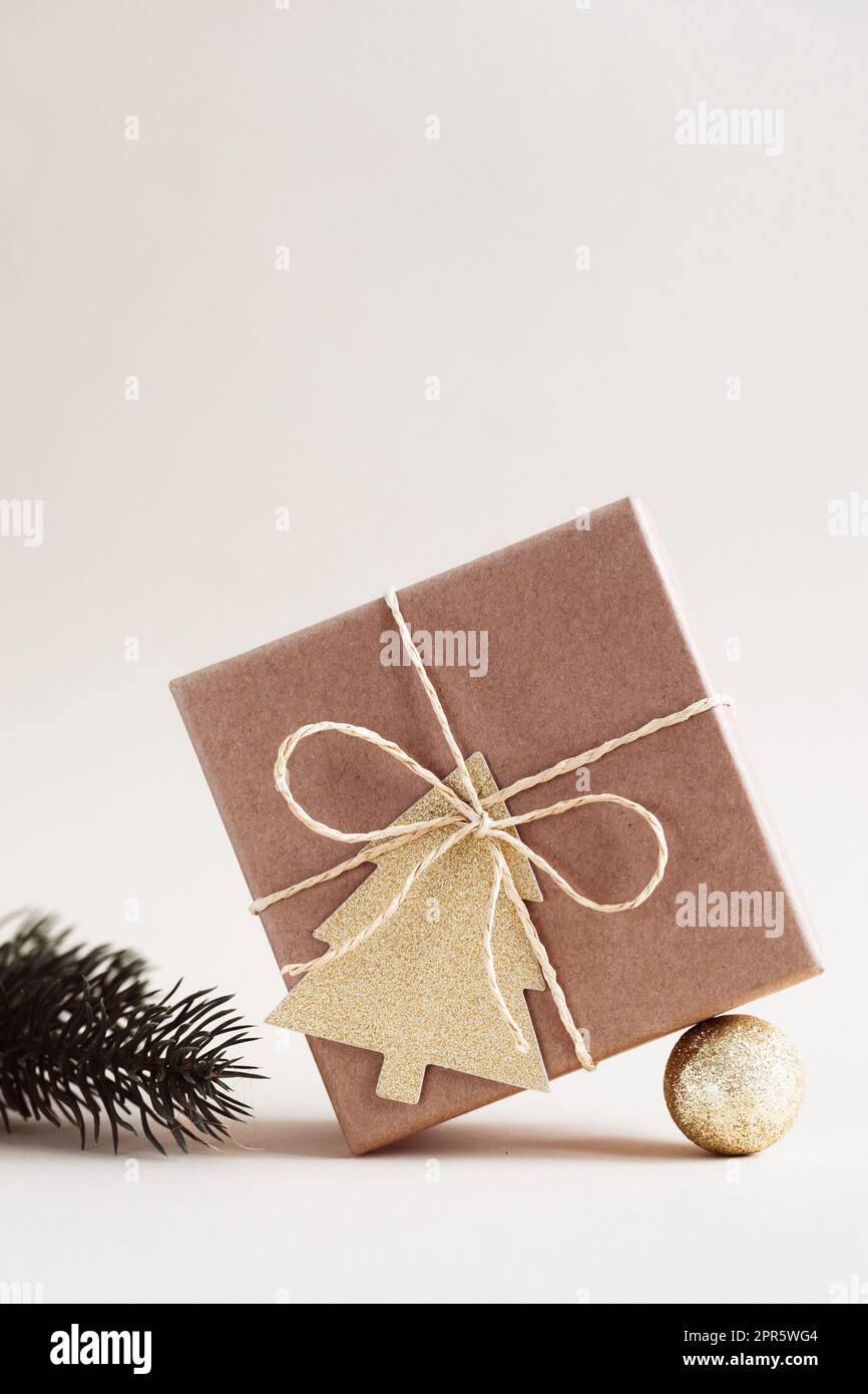 Christmas and zero waste, eco friendly packaging gifts in kraft paper. Christmas New Year Celebration Decorations Concept Stock Photo