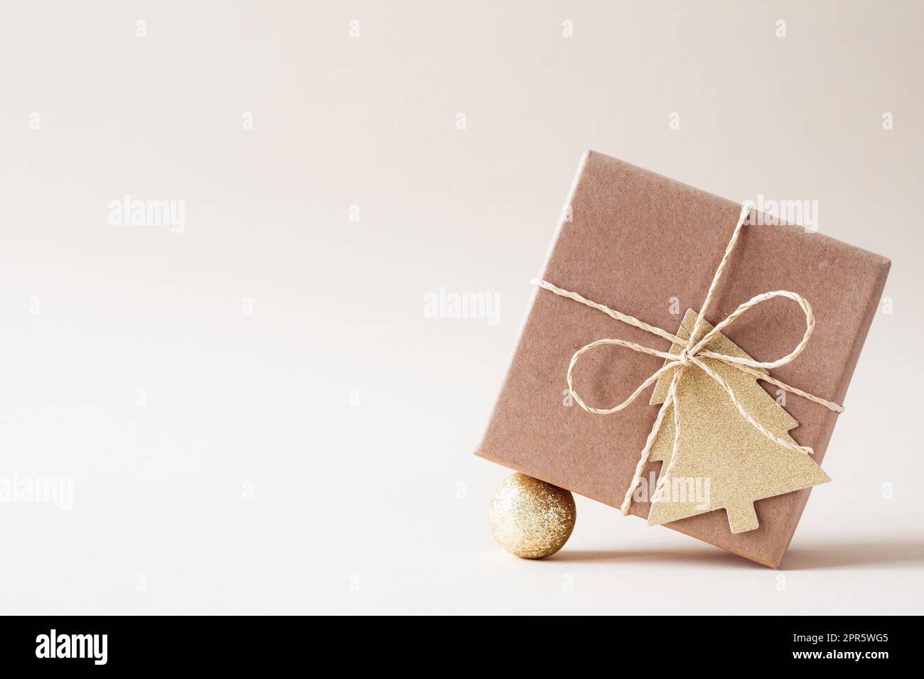 Christmas and zero waste, eco friendly packaging gifts in kraft paper. Christmas New Year Celebration Decorations Concept Stock Photo