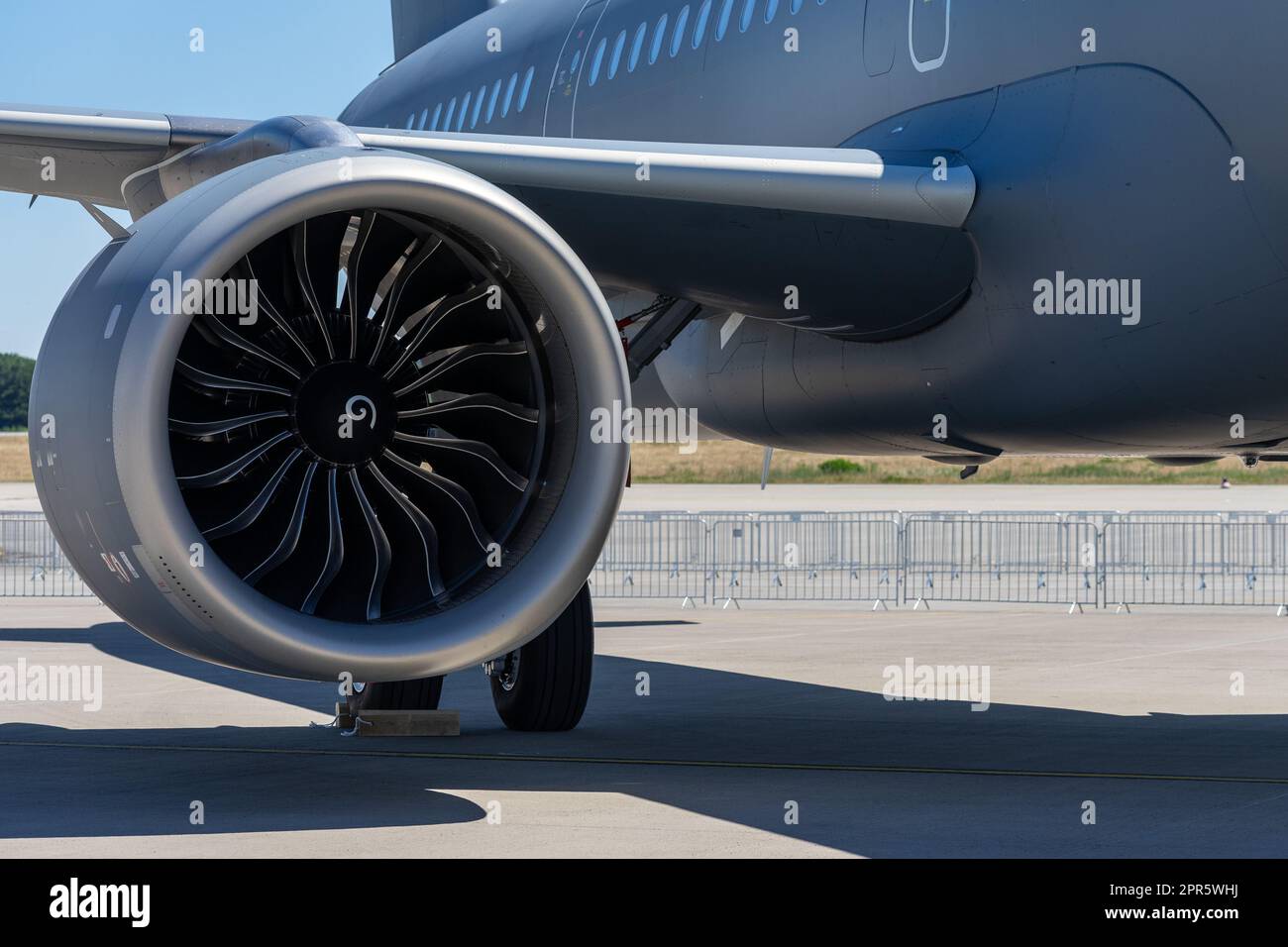 Jet engine, part of the wing and fuselage of a passenger aircraft. Stock Photo