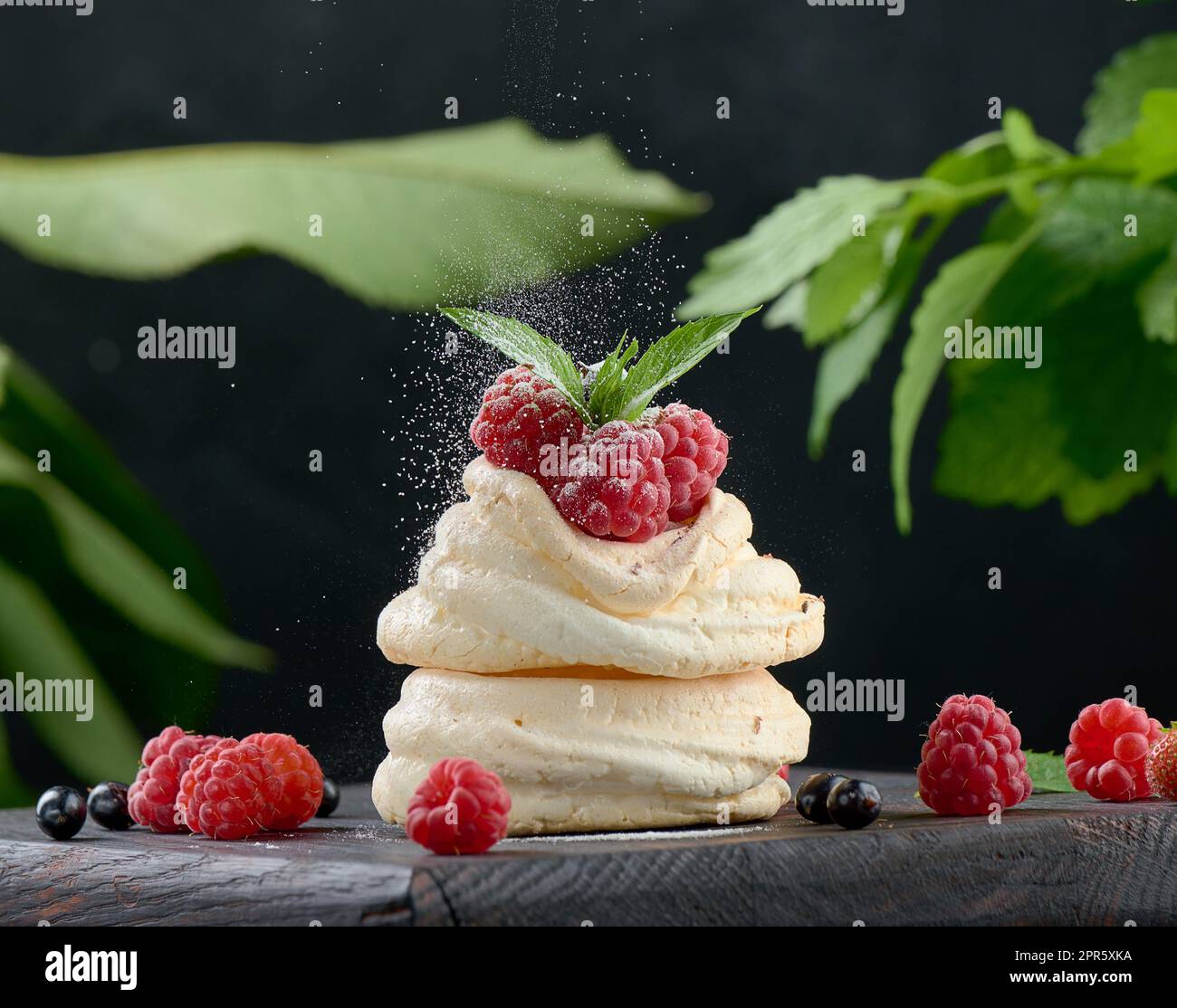 Baked cake made from whipped chicken protein and cream, decorated with fresh berries Stock Photo