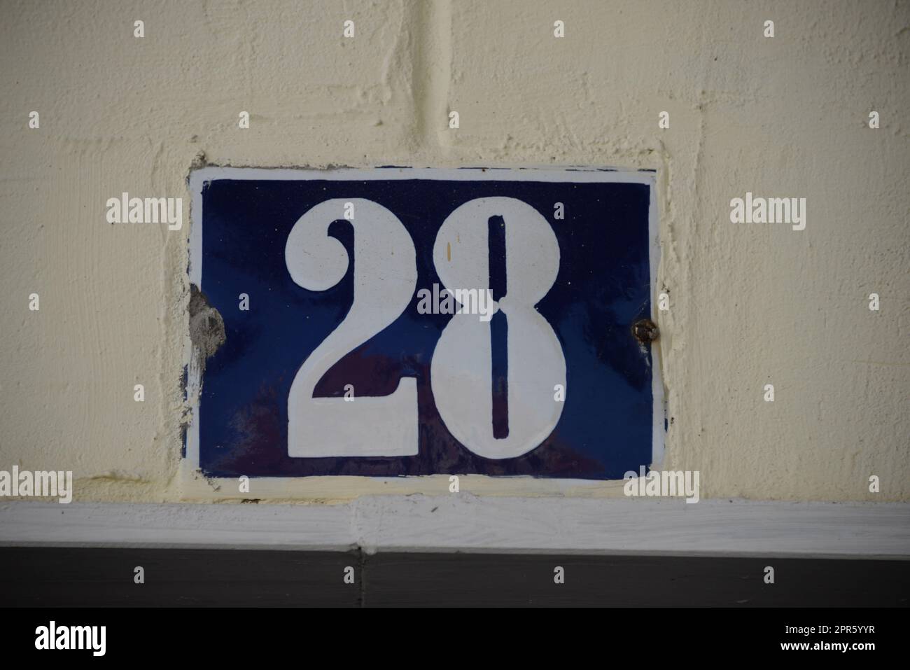 number 28 on a house in Lisbon - Lisboa - the capital of Portugal, September, 2018 Stock Photo