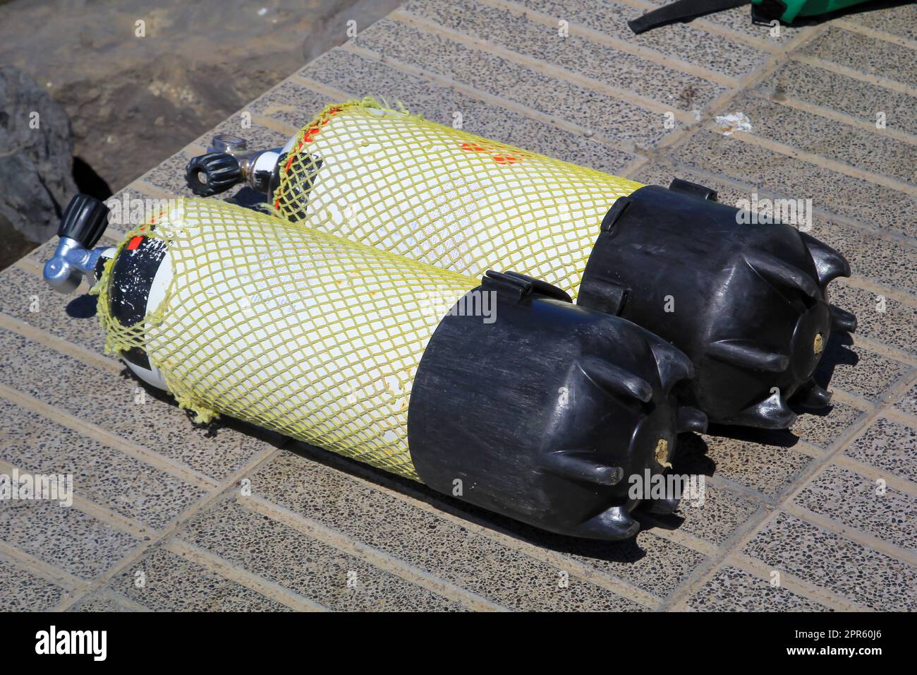 Two compressed air tanks, oxygen tanks for divers on the quay Stock