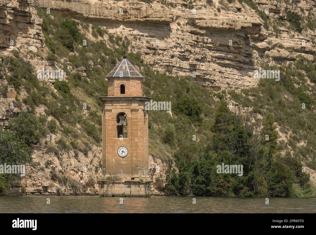 Tower of the Church of San Juan Evangelista in the Ribarroja reservoir, Aragon, Spain Stock Photo