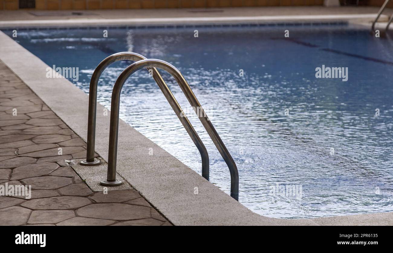 Swimming pool access stairs Stock Photo Alamy