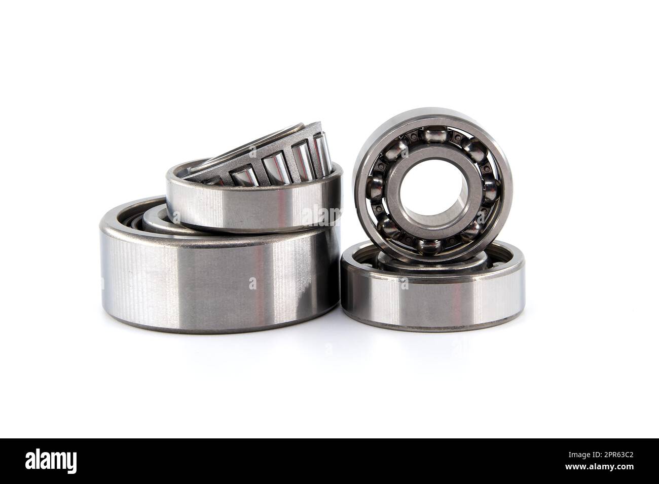 Set of various ball and roller bearings on white background. Car bearings, auto parts