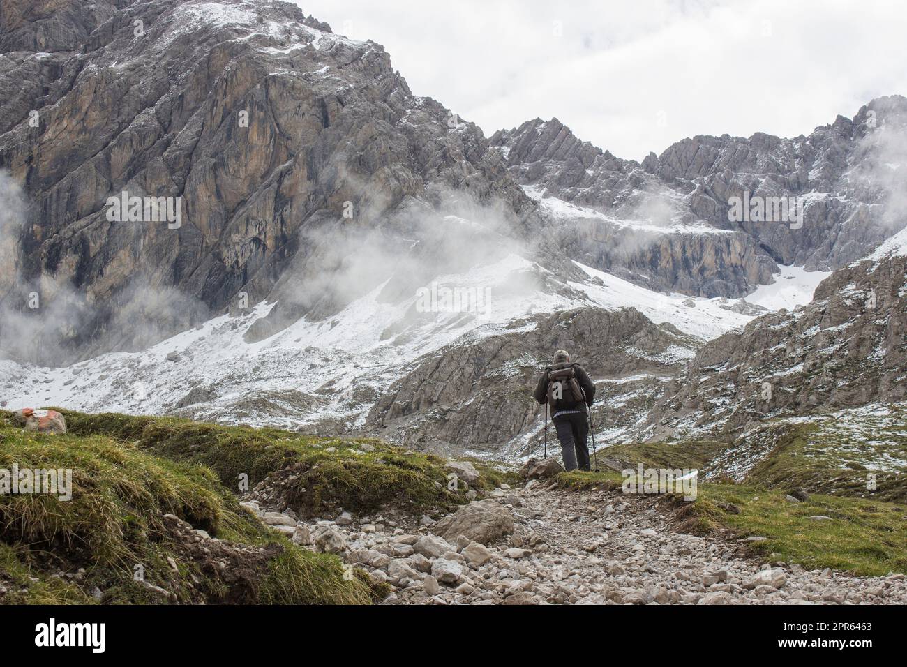 man trekking in the mountains, Alps in Austria, Lienzer Dolomiten, East Tyrol Stock Photo