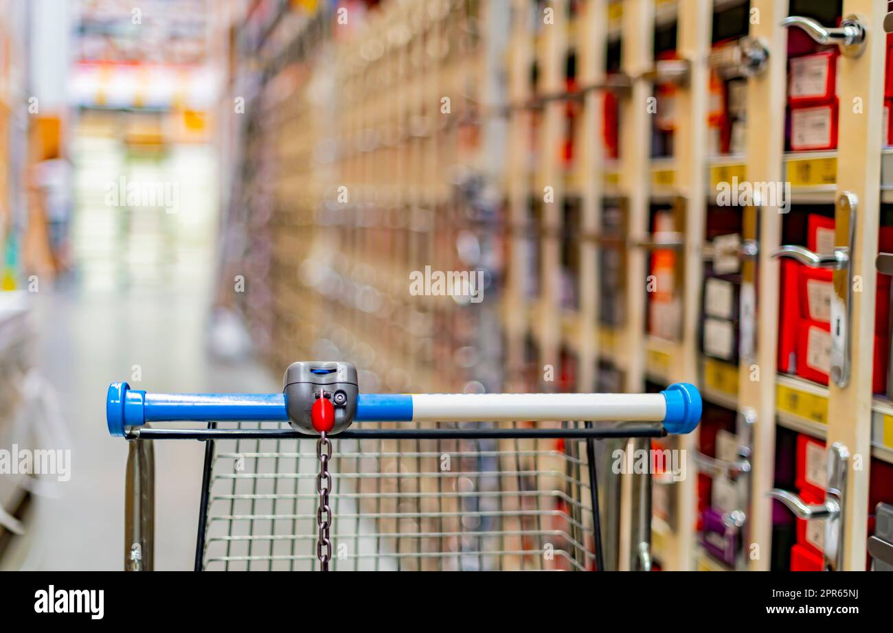 A shopping cart in a home improvement store Stock Photo