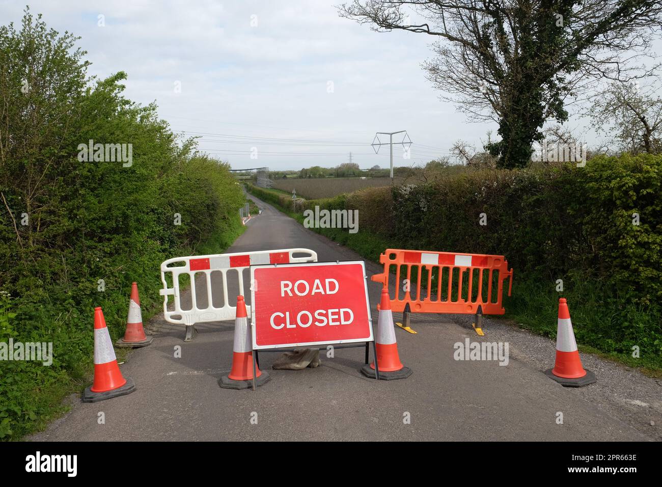 April 2023 - Road closed while power cables are installed as part of the Hinkley Point Nuclear Power Station connection project, Sandford, Somerset, Stock Photo