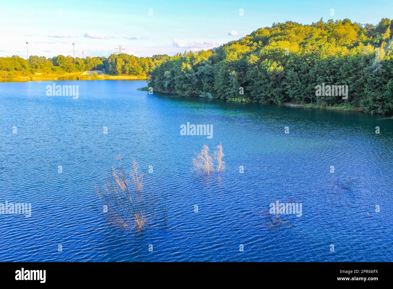 Beautiful quarry lake dredging pond lake blue turquoise water Germany