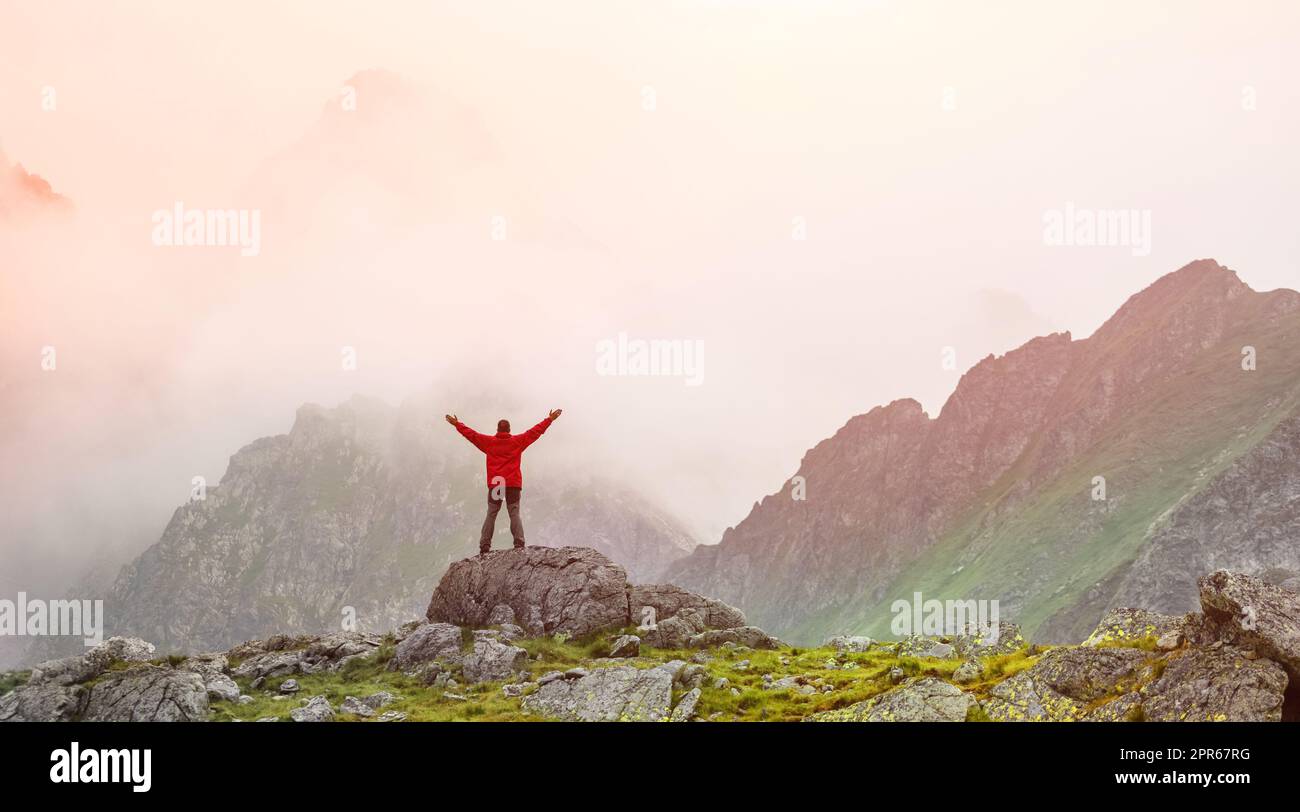 Standing on cliff top hi-res stock photography and images - Alamy