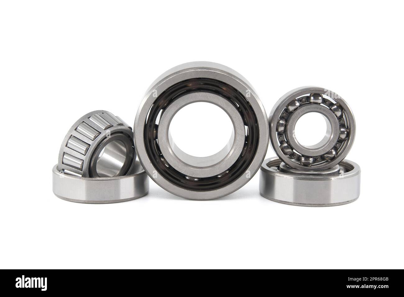 Group of various ball and roller bearings on white Stock Photo - Alamy