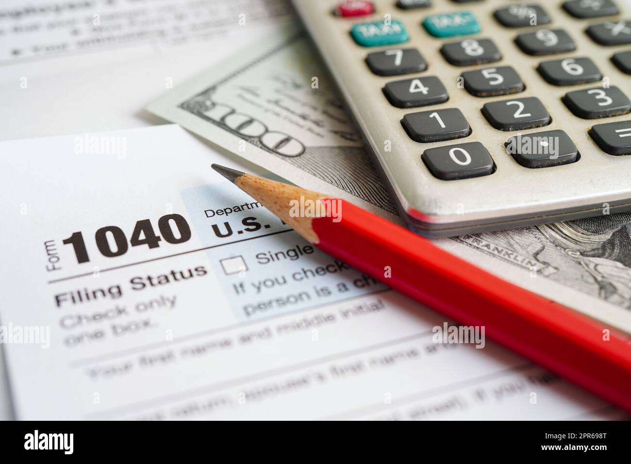 Premium Photo  Pen and coins on the tax form