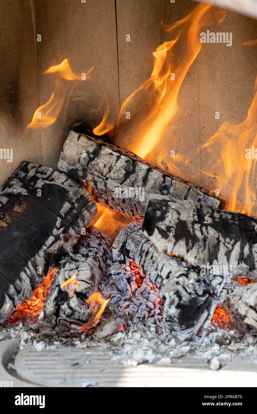 Burning wood in a fireplace with a lot of hot embers Stock Photo Alamy