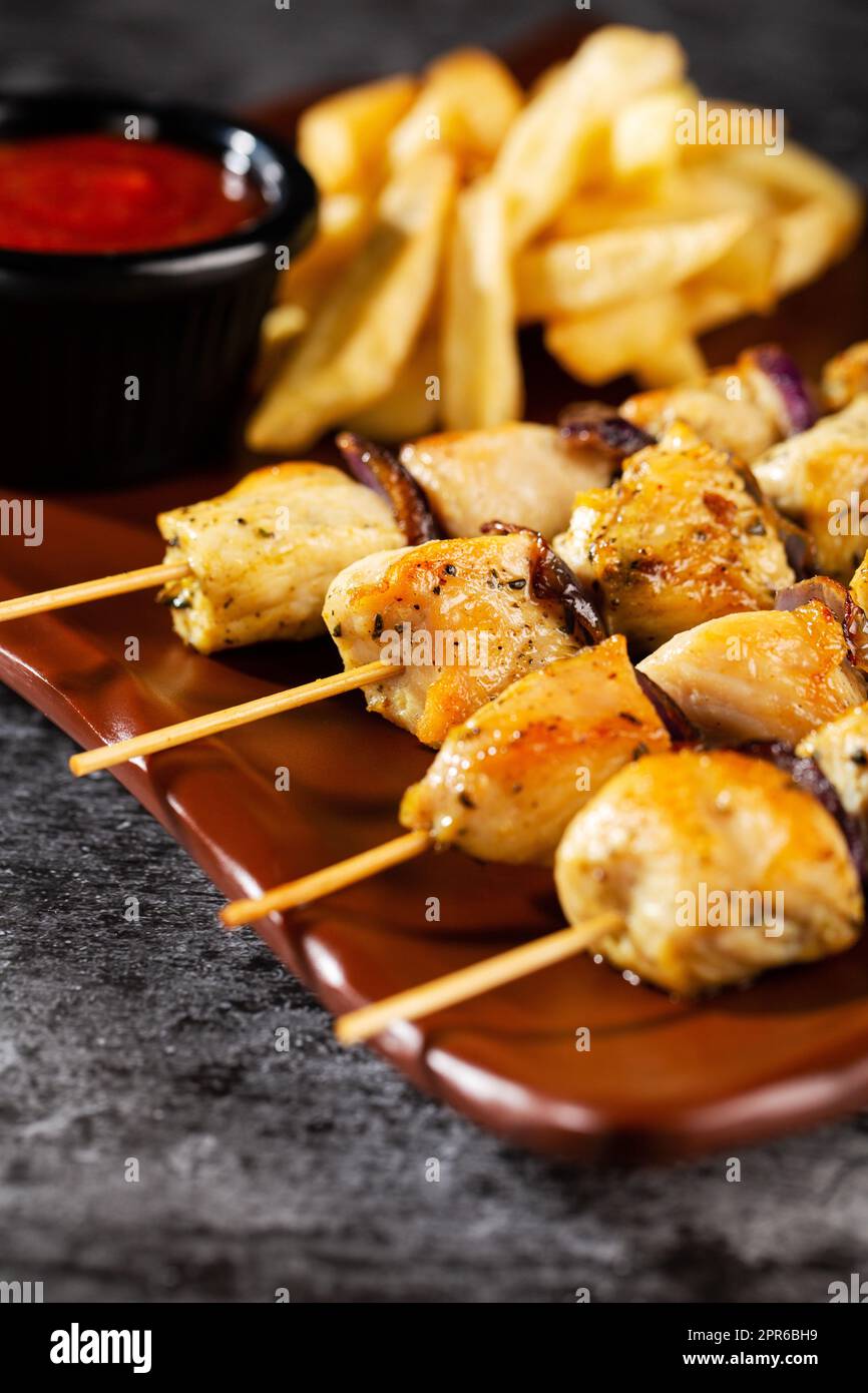 Chicken skewers. Pieces of tender chicken fillet, grilled with sweet