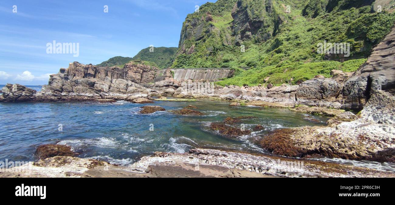 Strange rocks and rocks stretching hundreds of meters, can be said to be Bamboo Shoot Rock, Ice Cream Rock, Sea Dog Rock, etc. in the Natural Geology Classroom, New Taipei City, Taiwan Stock Photo