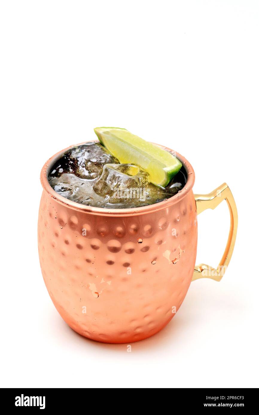 Moscow Mule, classic drink with vodka, lemon juice, sugar and a piece of macerated ginger and