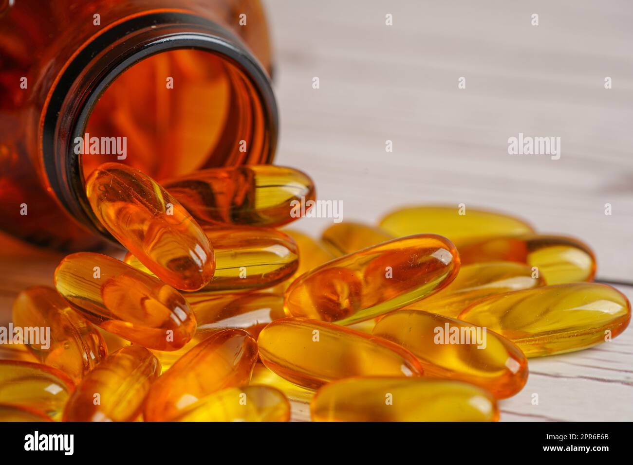 Fish oil or Cod liver oil gel in capsules with omega 3 vitamins