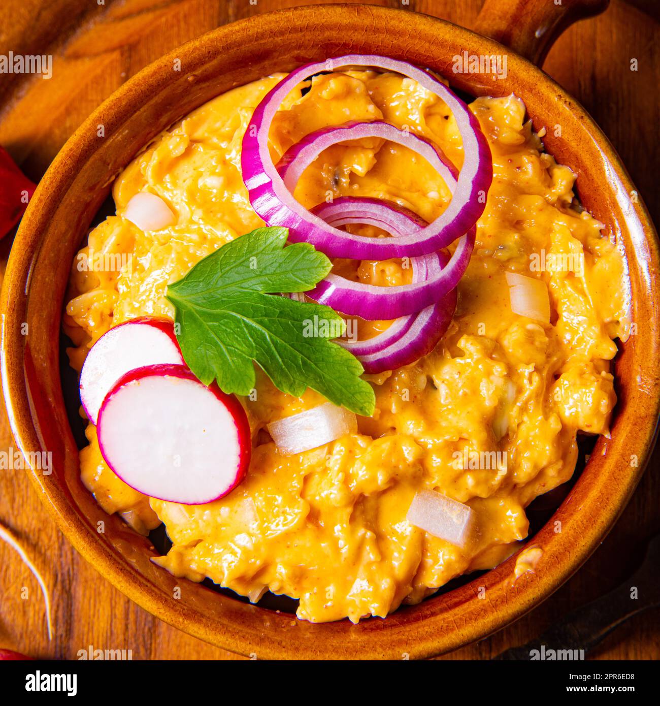 rustic Bavarian obazda with radishes and onions Stock Photo - Alamy