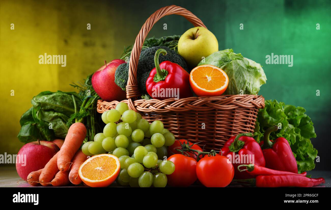 Fresh organic fruits and vegetables in wicker basket Stock Photo Alamy