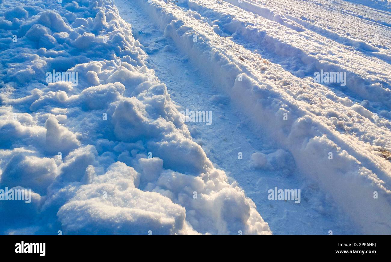 Traces of car tires in the snow Bremerhaven Germany Stock Photo - Alamy