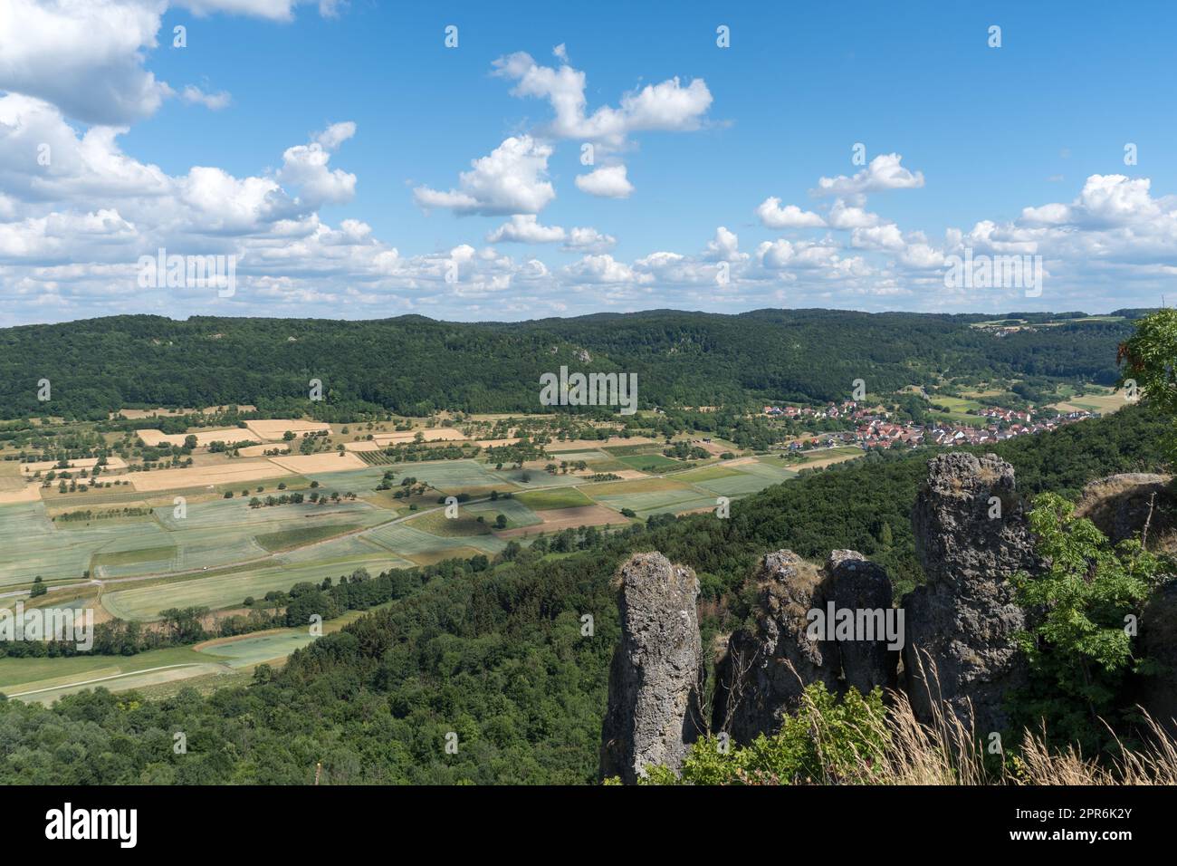 View from the franconian mountain called Ehrenbuerg to the village Weilersbach Stock Photo