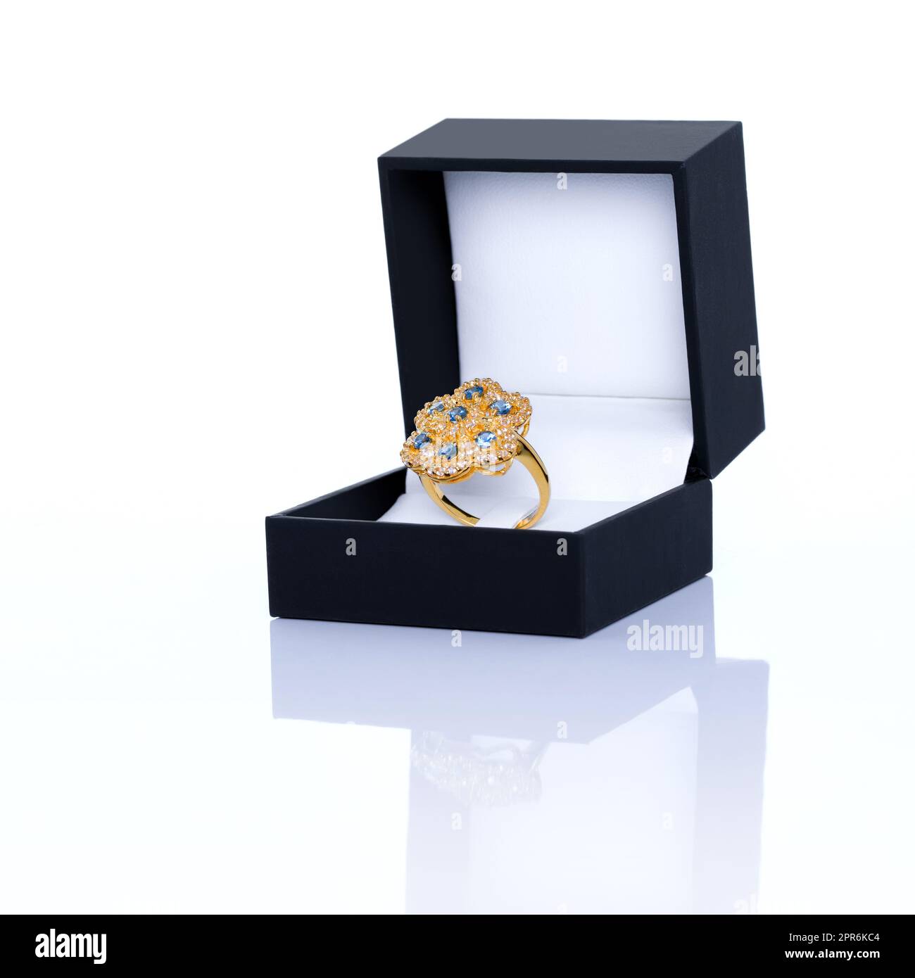 Blue Sapphire and Diamond Jewel or gems ring in dark blue jewel box