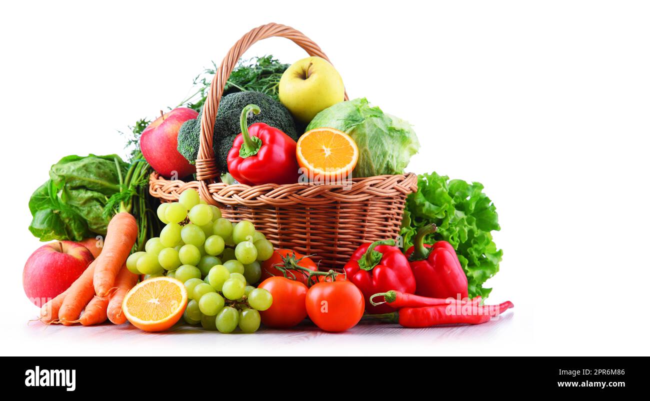 Fresh organic fruits and vegetables in wicker basket Stock Photo - Alamy