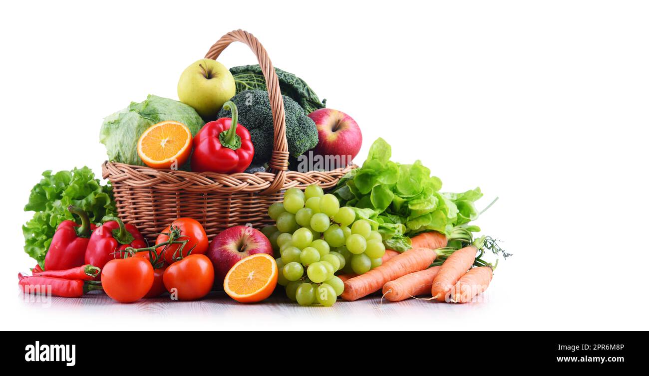 Fresh organic fruits and vegetables in wicker basket Stock Photo - Alamy