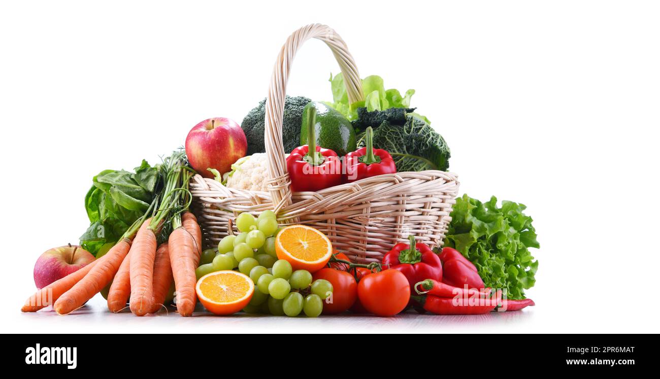 Fresh organic fruits and vegetables in wicker basket Stock Photo - Alamy