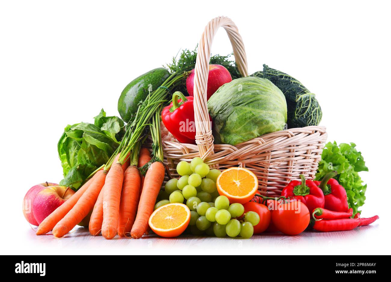 Fresh organic fruits and vegetables in wicker basket Stock Photo - Alamy