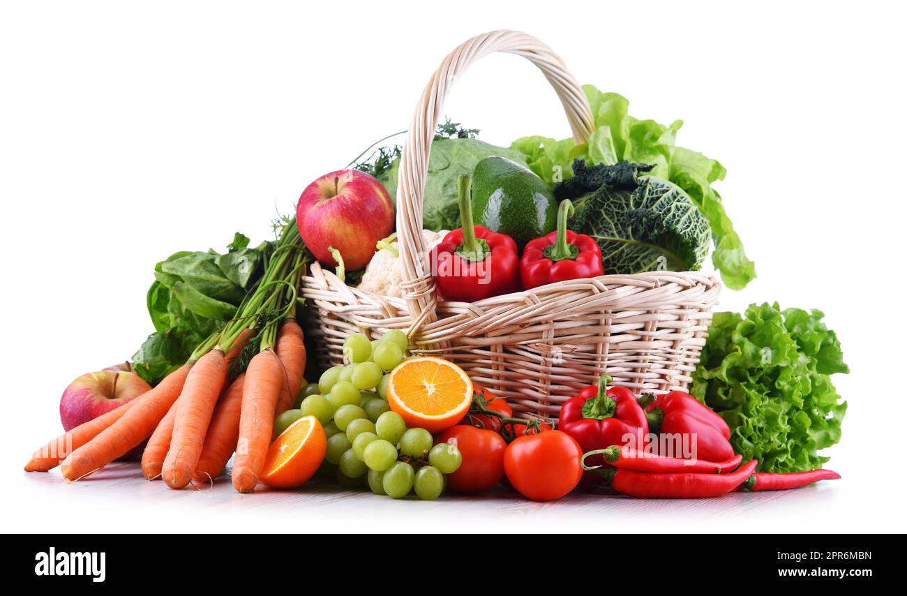 Fresh organic fruits and vegetables in wicker basket Stock Photo - Alamy
