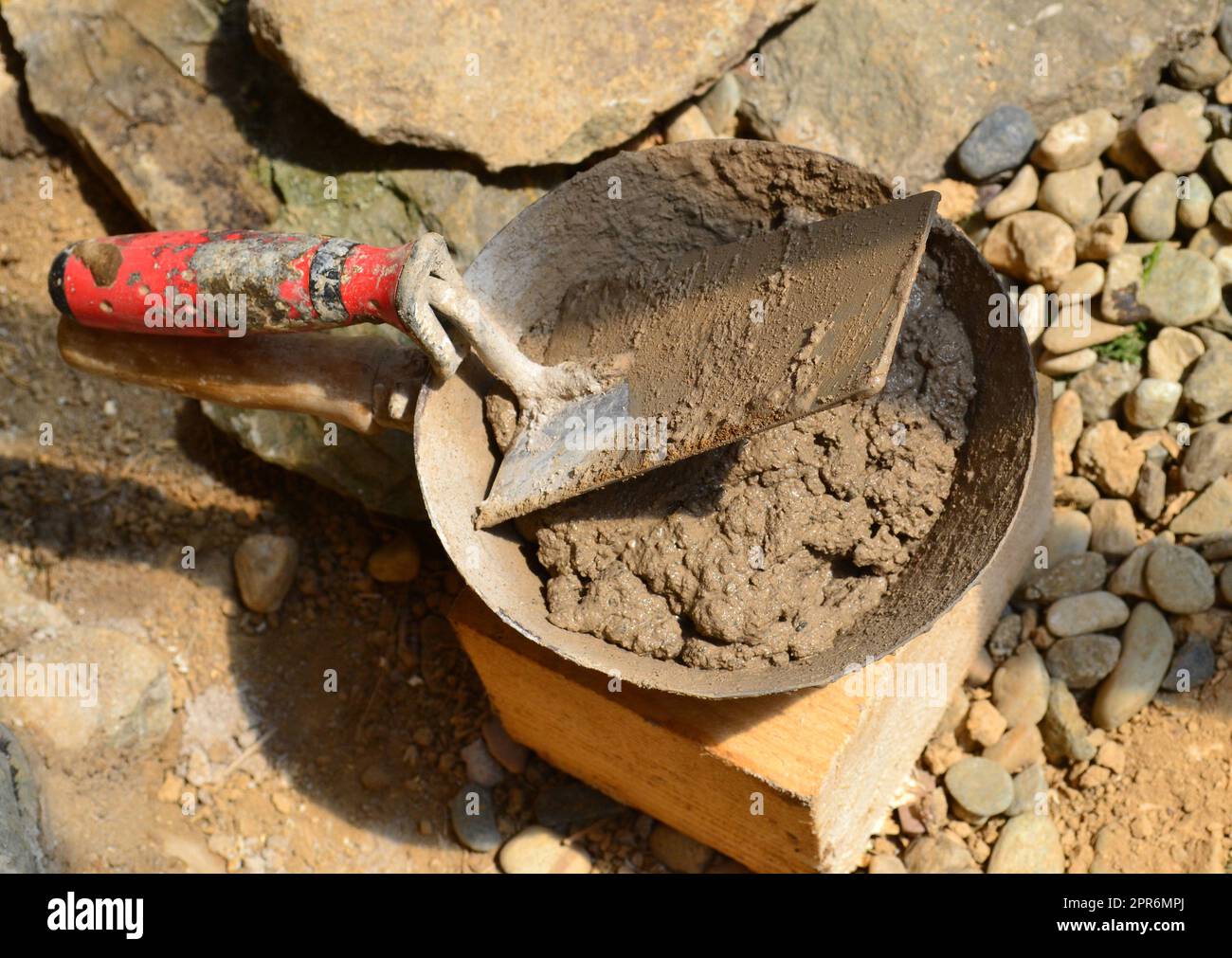 Trowel and ladle, plastering tools Stock Photo