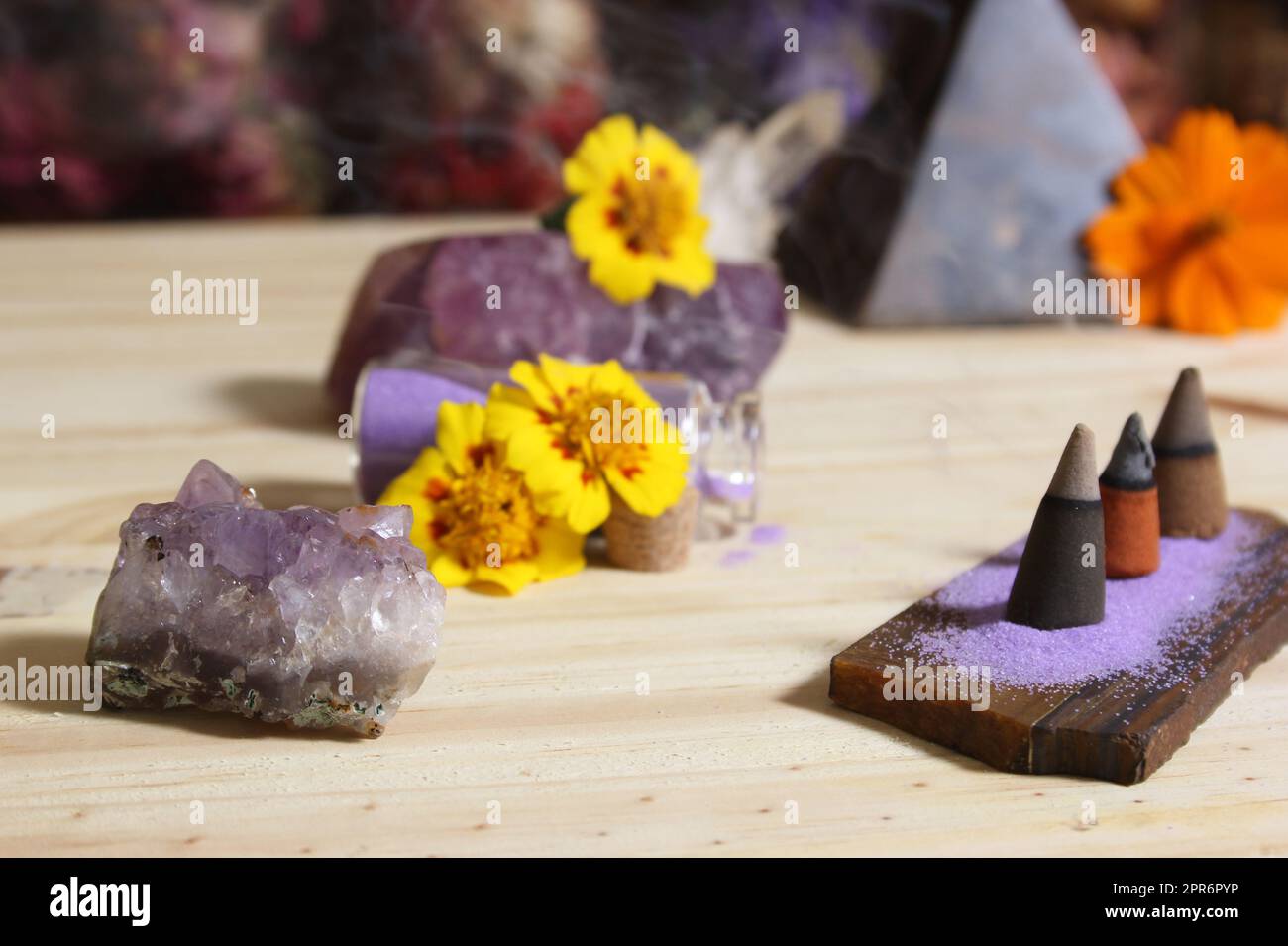 Incense Cones on Stone Slab With Crystals and Flowers Stock Photo Alamy