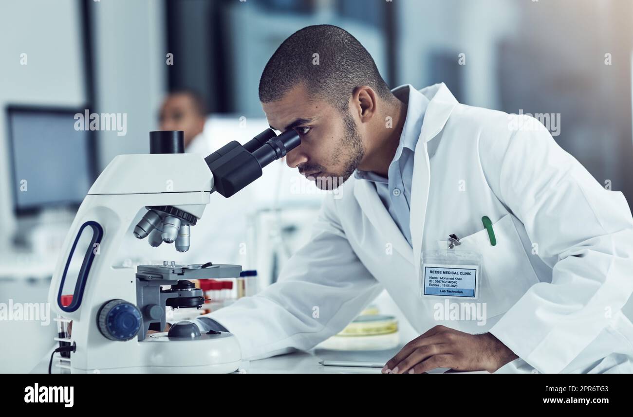 Success never rests, neither do diseases. Cropped shot of a young male scientist working in his lab. Stock Photo