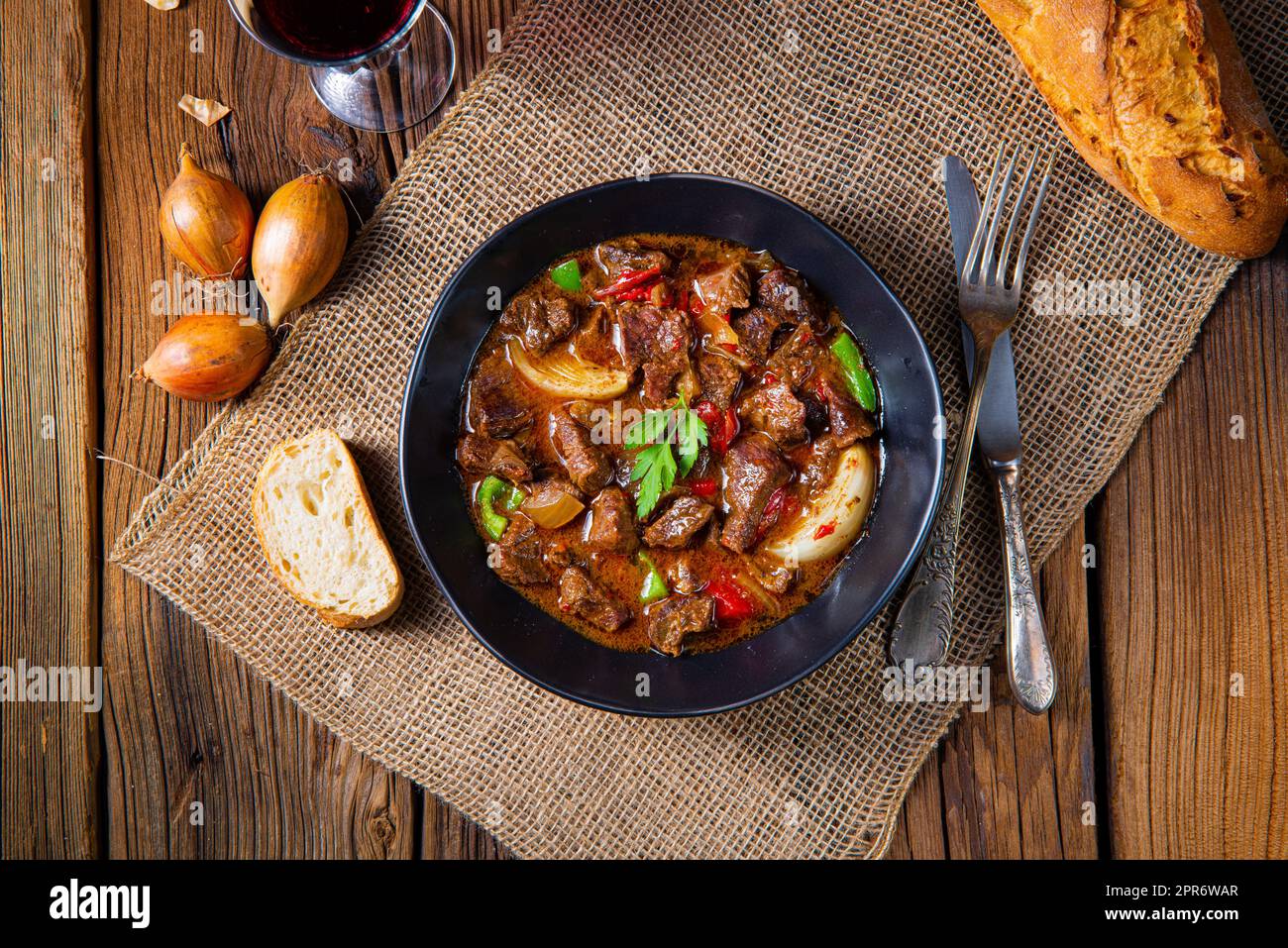 classic beef goulash with peppers and onions Stock Photo - Alamy