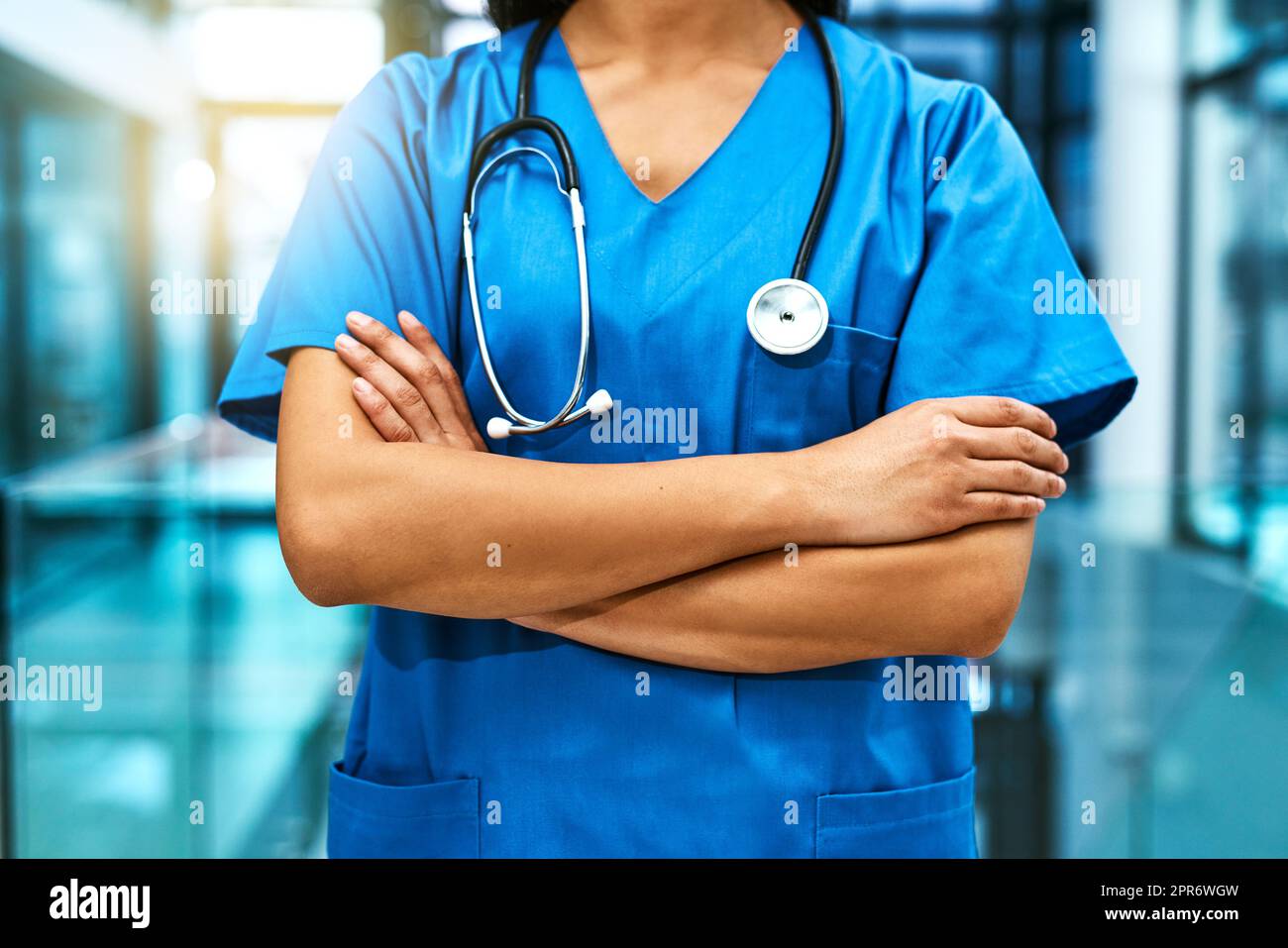 These hands will take care of you. Shot of an unrecognisable nurse standing in a hospital. Stock Photo