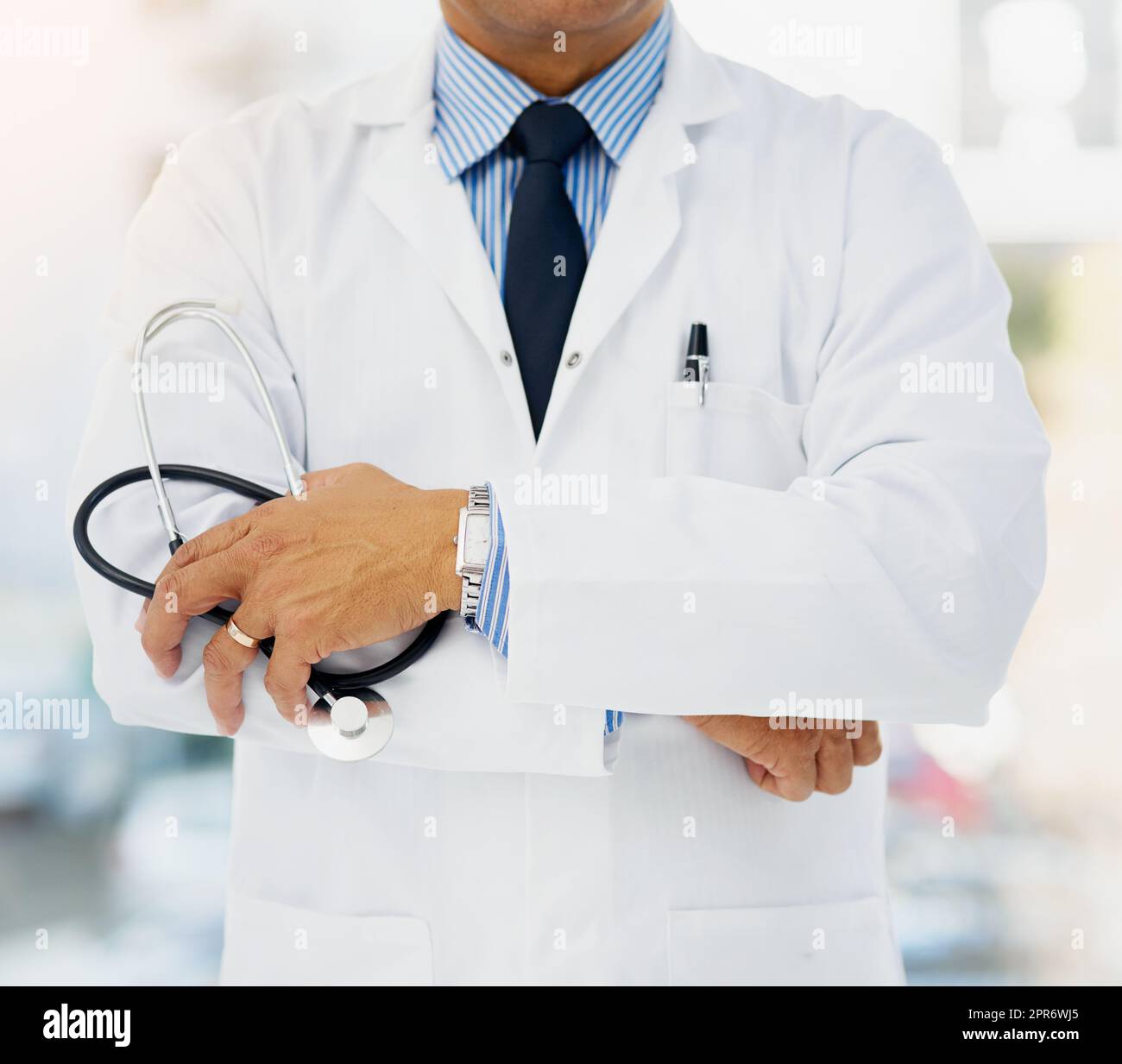 Doctor holding a stethoscope hi-res stock photography and images - Alamy