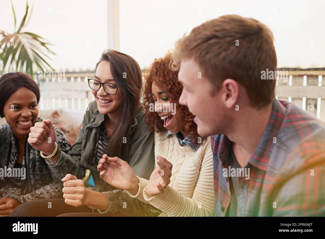 Making times to remember. Cropped shot of a group of friends laughing and having a good time. Stock Photo