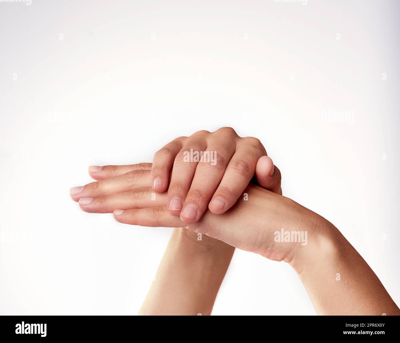 Skin has never been so soft. Closeup studio shot of a womans hands. Stock Photo