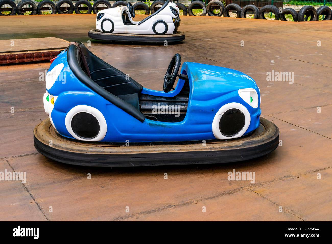 Electric bumper cars or dodgem cars at the amusement park Stock Photo