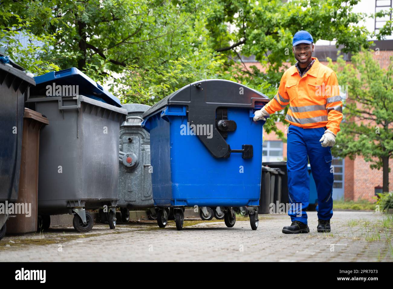 Garbage Removal Man Doing Trash Stock Photo Alamy