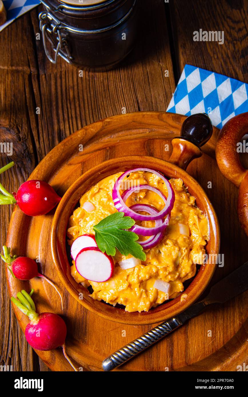 rustic Bavarian obazda with radishes and onions Stock Photo - Alamy