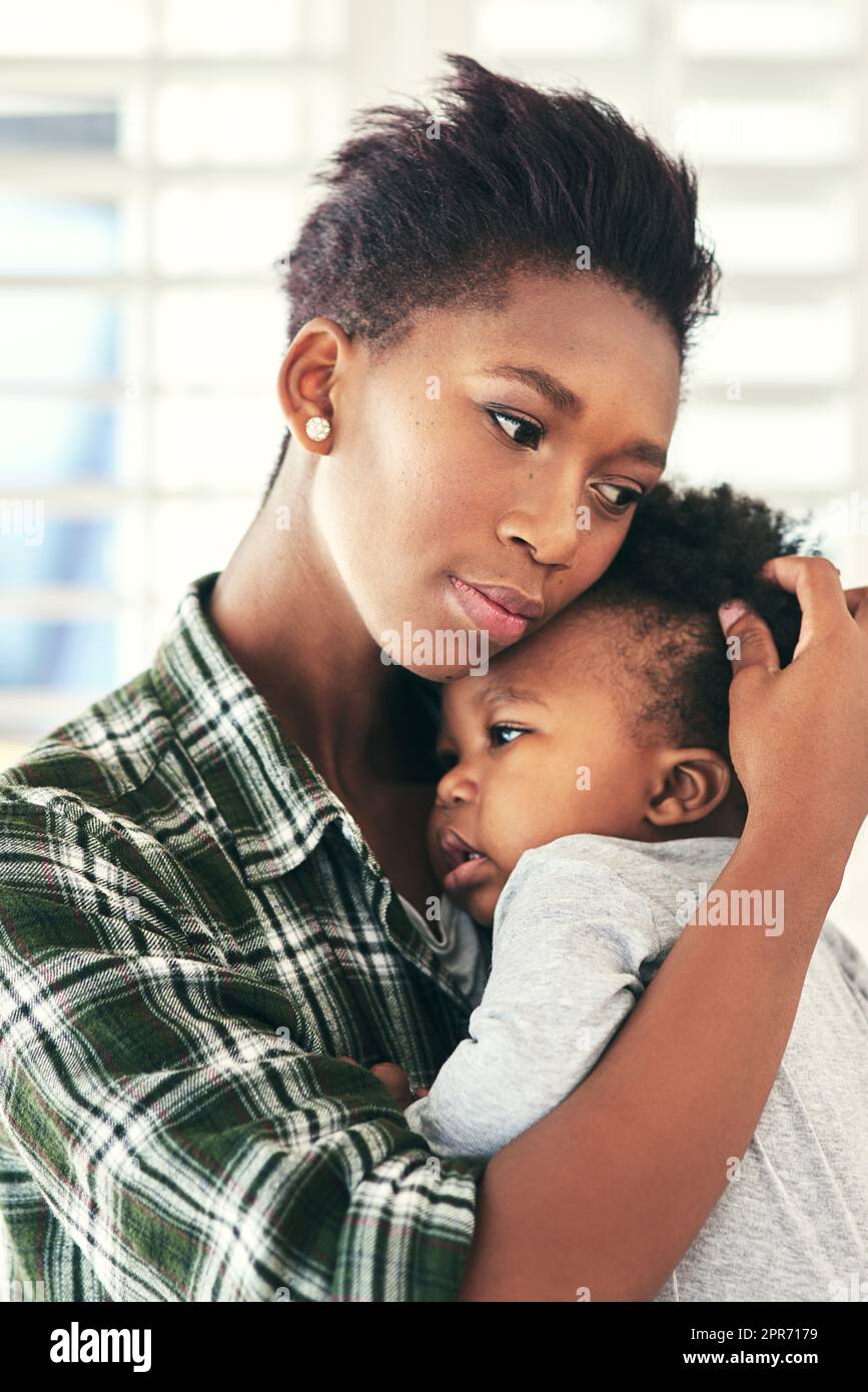 Theres no bond stronger.... Shot of a mother cradling her little baby boy. Stock Photo