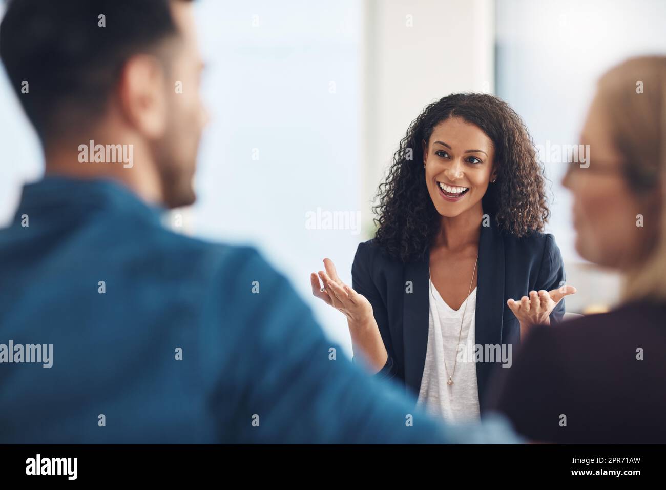 Lessons in love. Shot of a young therapist speaking to a couple during a counseling session. Stock Photo