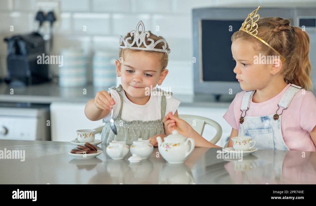 Two girls having tea hi-res stock photography and images - Alamy