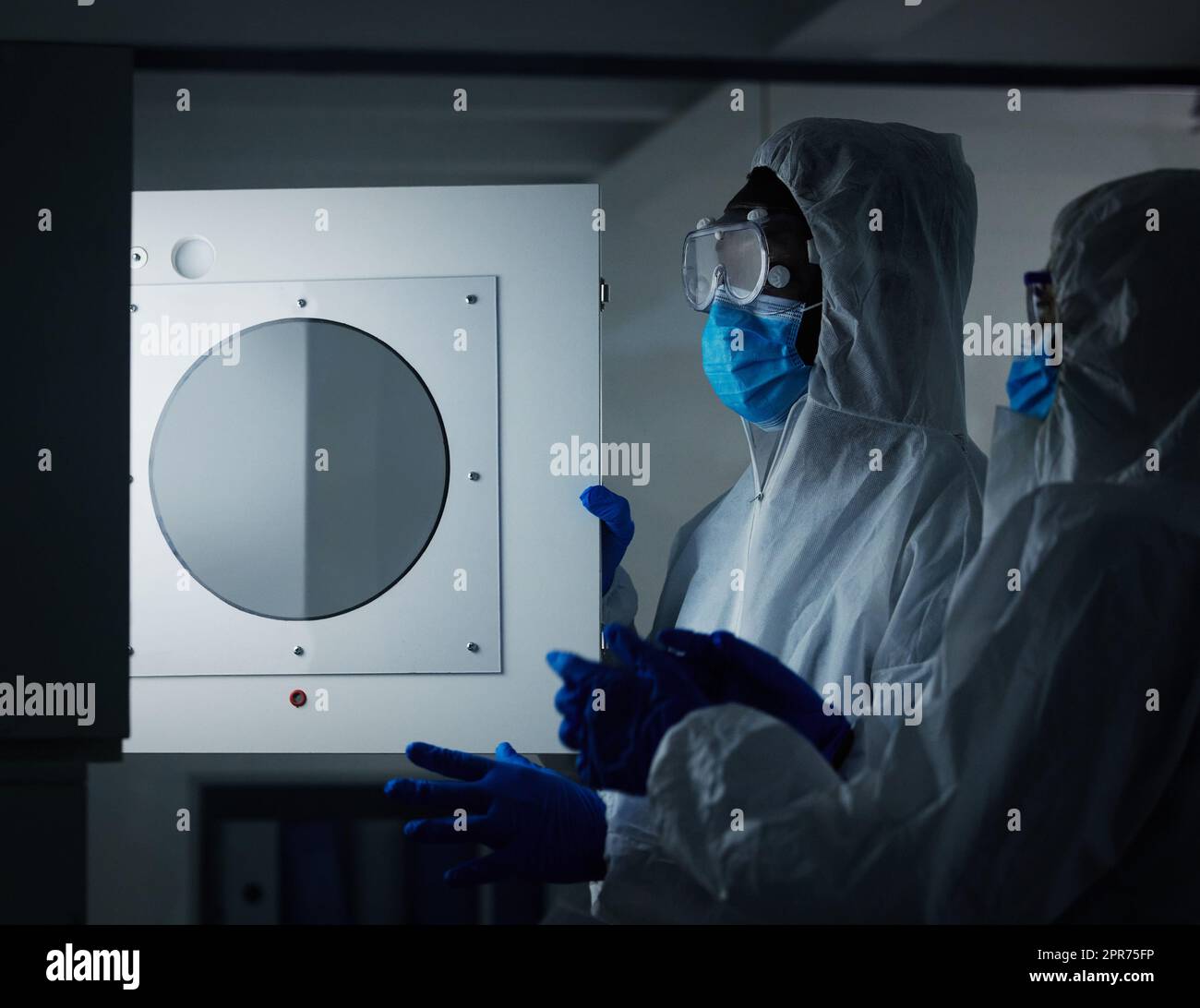 Keeping everything safe. Shot of two scientists working at a lab. Stock Photo