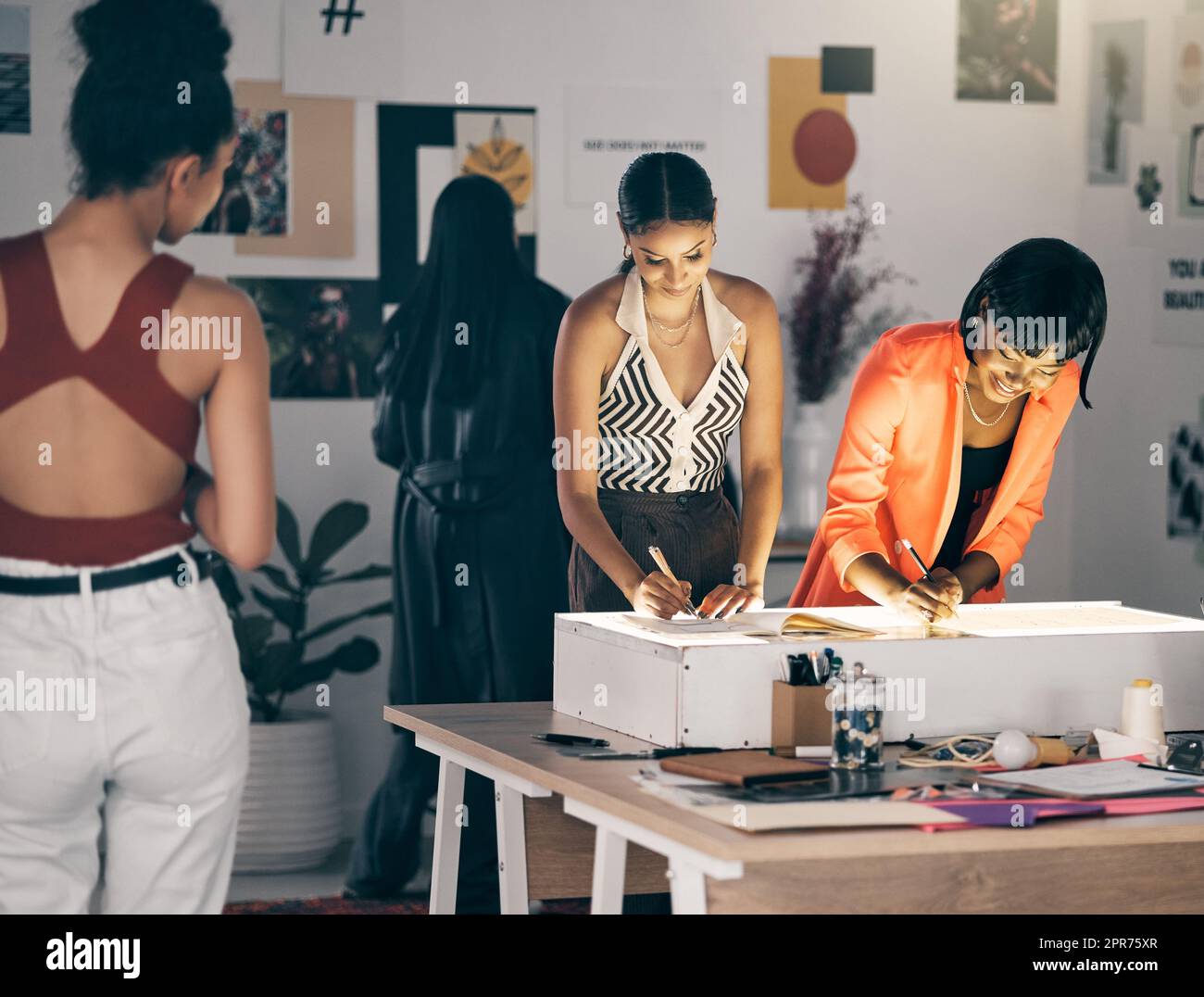 Only the best. Shot of a group of designers collaborating at a workshop together. Stock Photo