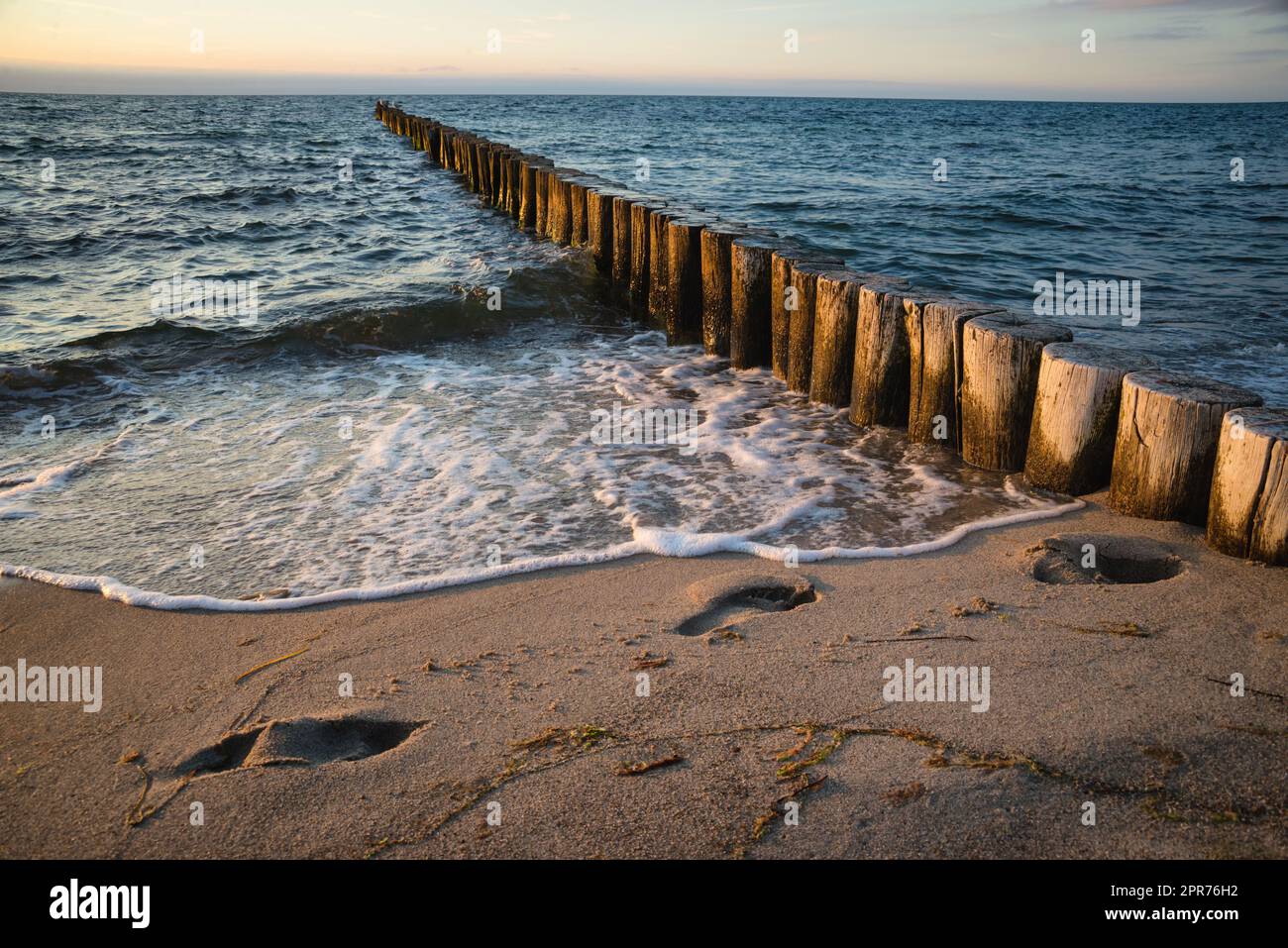 Footprints on the beach Stock Photo