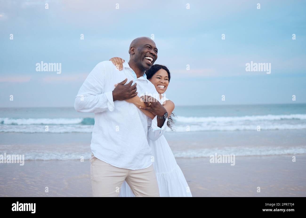 Straight to our future, no shortcuts. Shot of a beautiful couple spending time together at the beach. Stock Photo
